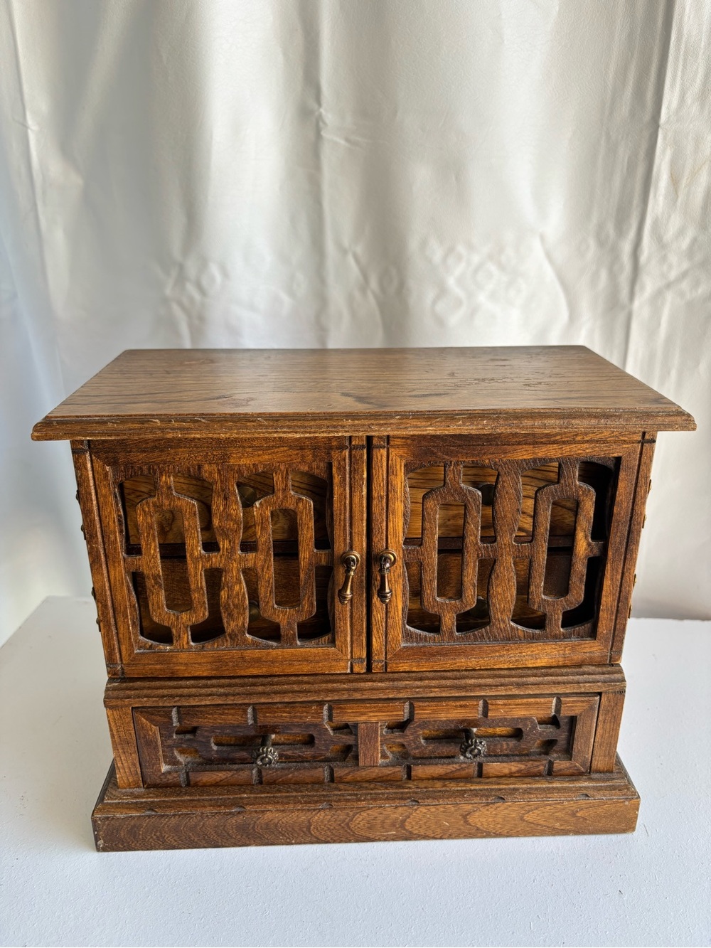Vintage wooden jewelry box with doors and drawers